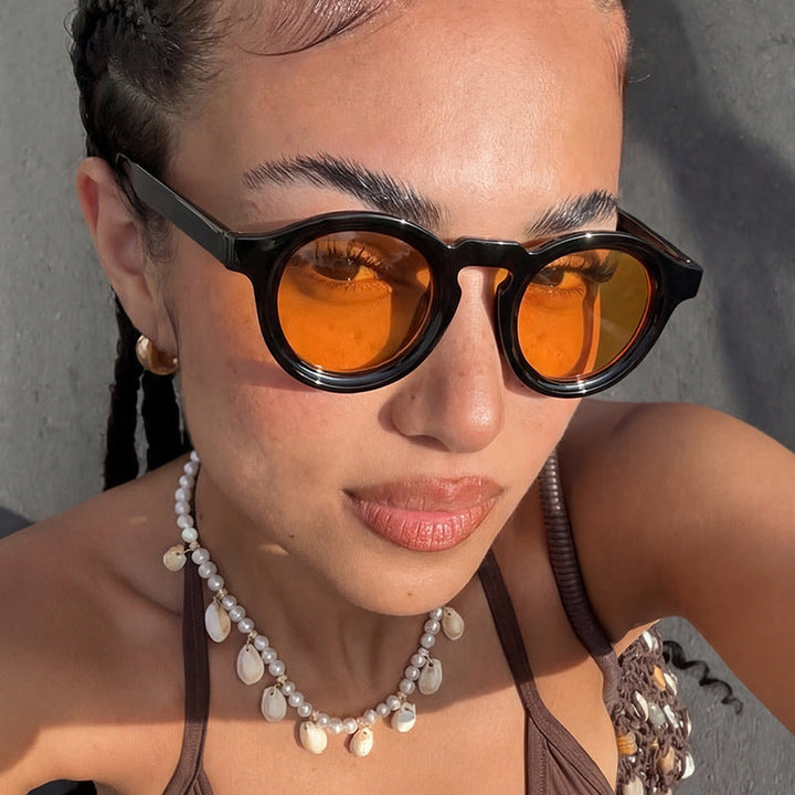 Women's fashionable round sunglasses with transparent frame and UV protection Kalsten