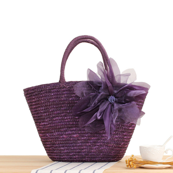 Elegant straw bag with floral accents Kalsten