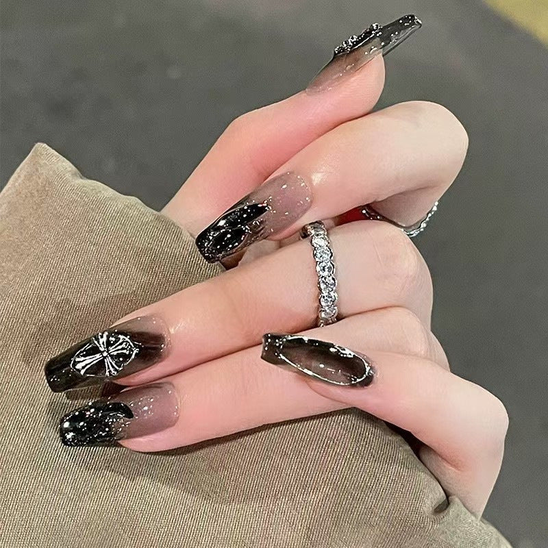 Glamorous artificial nails with heart design and glittering accents Kalsten