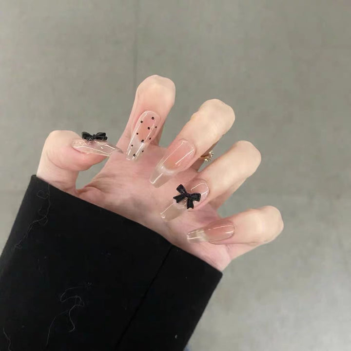 Artistic artificial nails with elegant bow motifs Kalsten