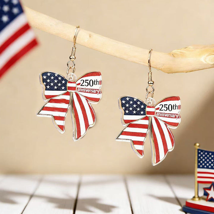 Women's eye-catching statement earrings made of acrylic with patriotic bow pendant Kalsten