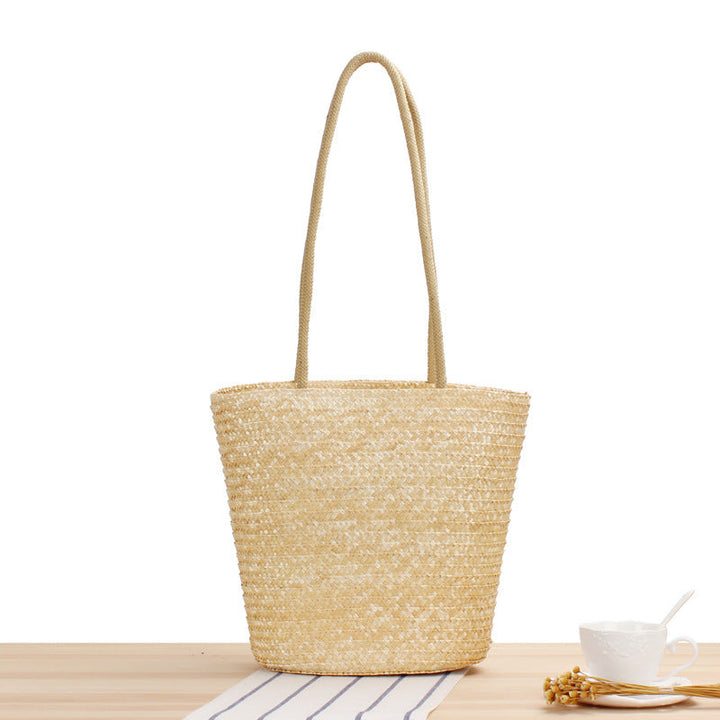 Shoulder bag made of braided natural material with long shoulder straps Kalsten