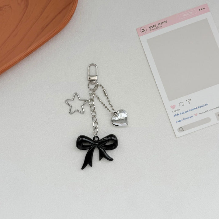 Playful Bow and Star Keychain Kalsten