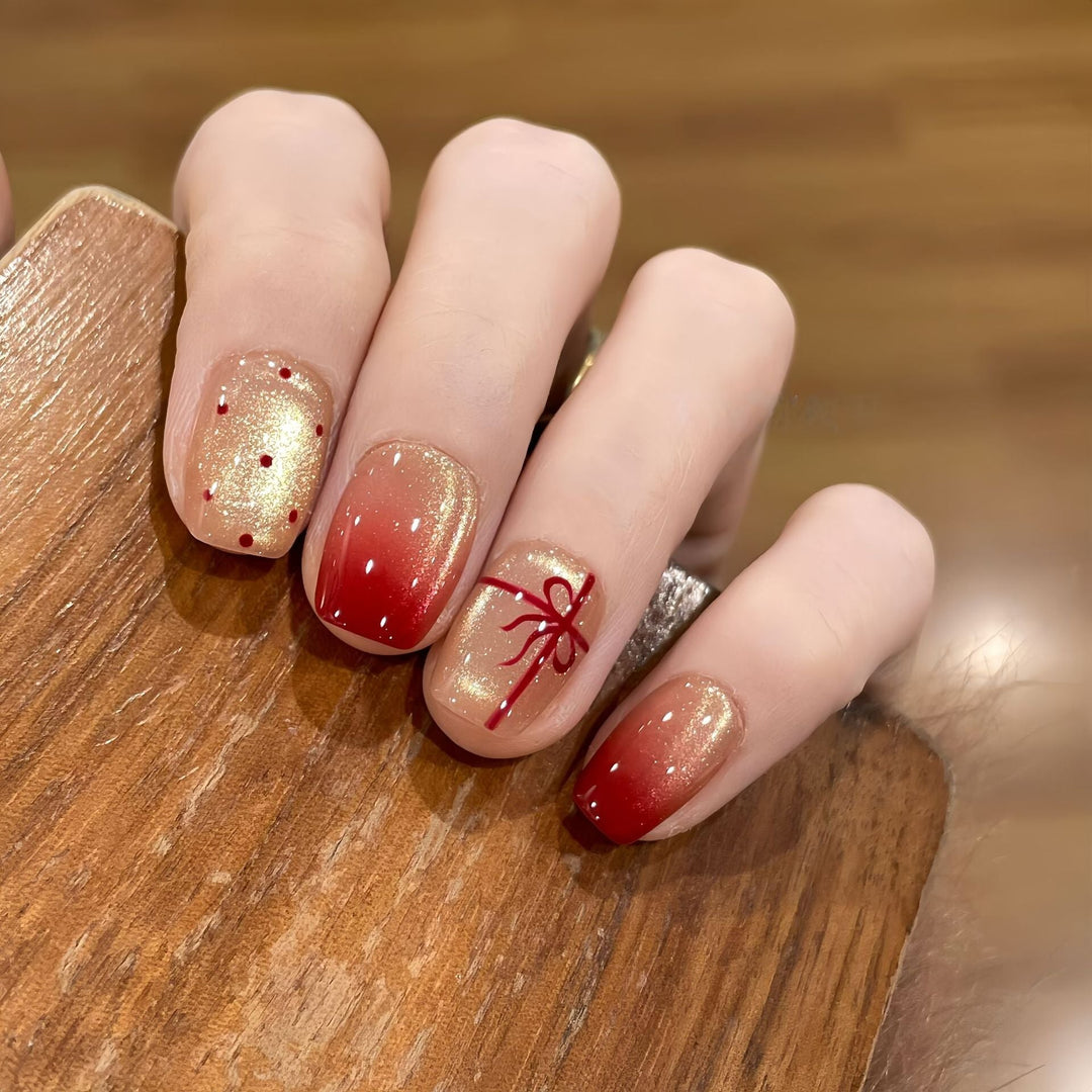 Artificial nails with festive gradient color and elegant decorations Kalsten