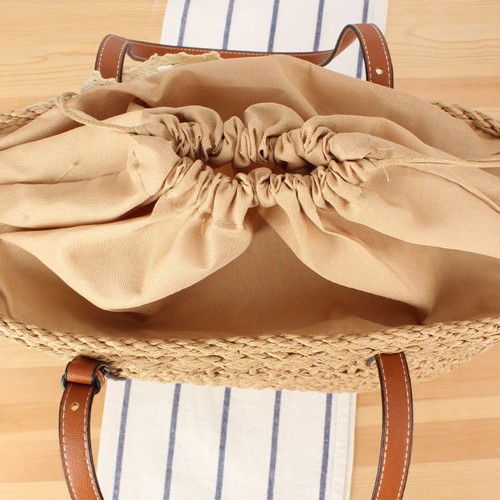 Elegant Braided Raffia Bag with Leather Accent Kalsten