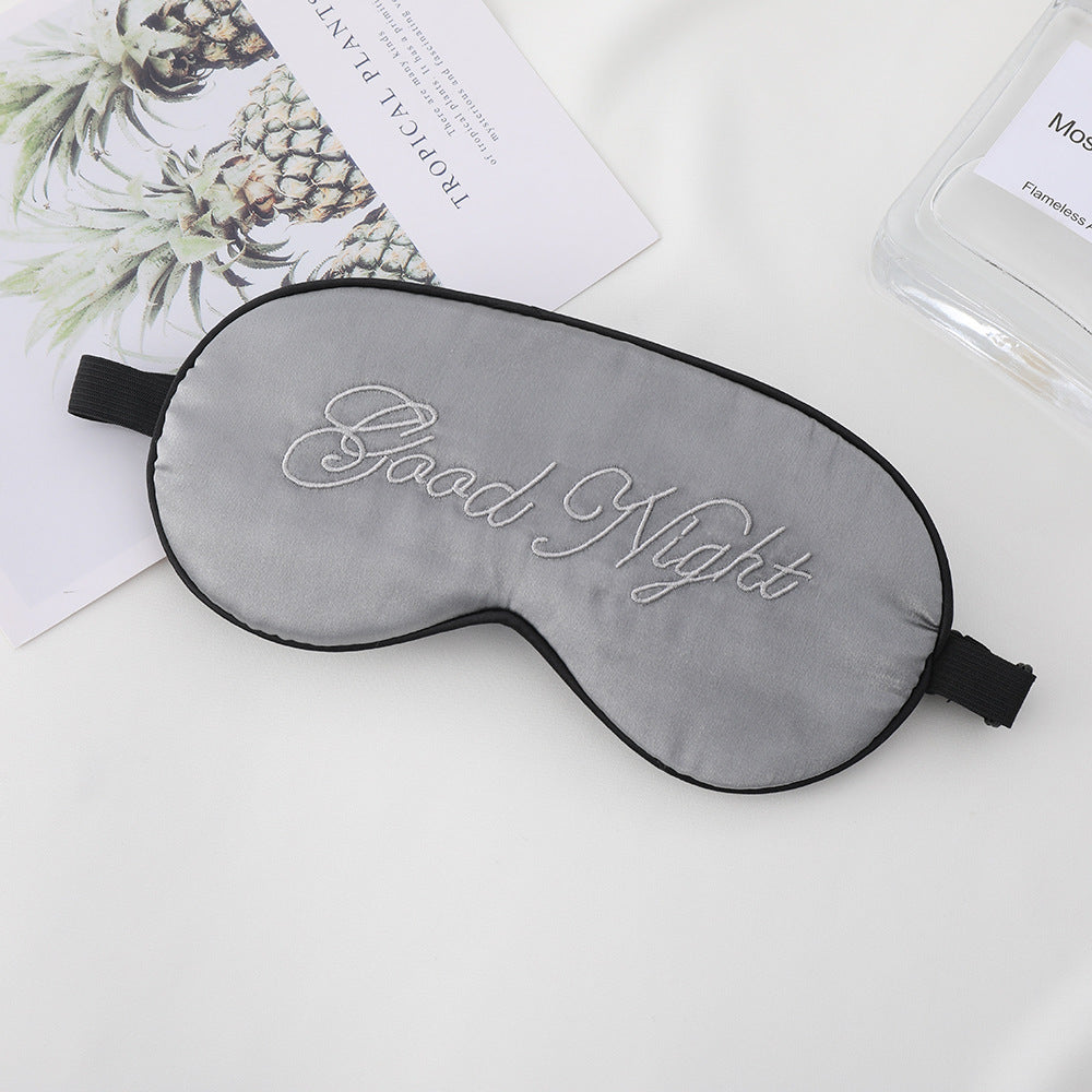 Unisex embroidered contoured sleep mask with decorative text embroidery and adjustable elastic band Kalsten