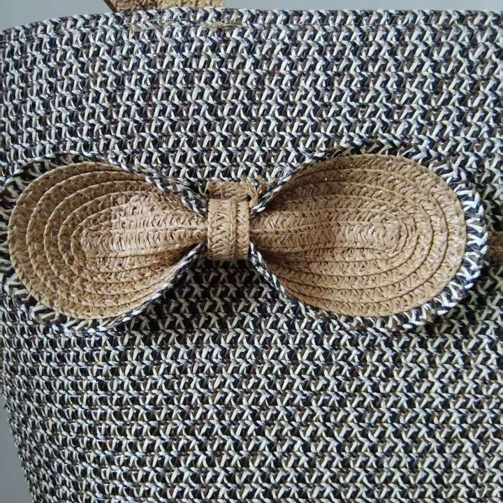 Elegant straw bag with decorative bow closure Kalsten