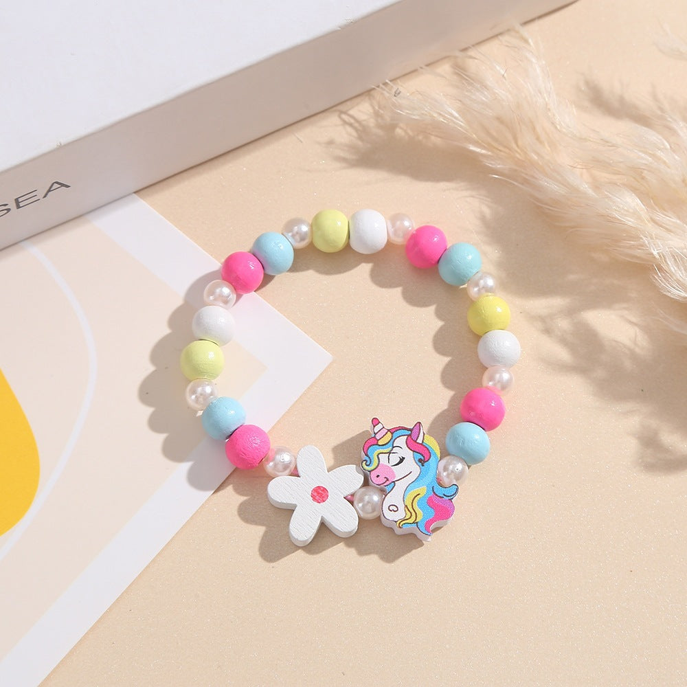 Playful children's bracelet with unicorn and flower motif Kalsten