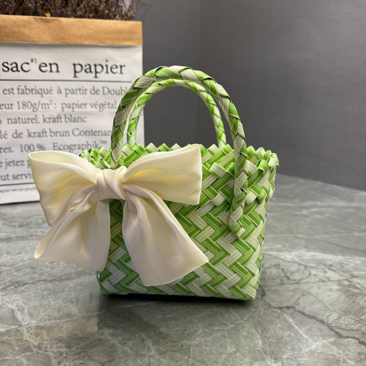 Playful basket bag with bow Acalora