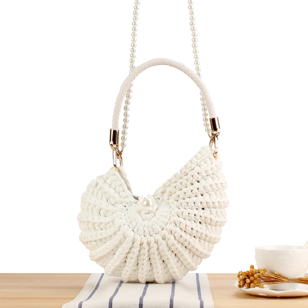 Evening bag with pearl decorated handle Kalsten