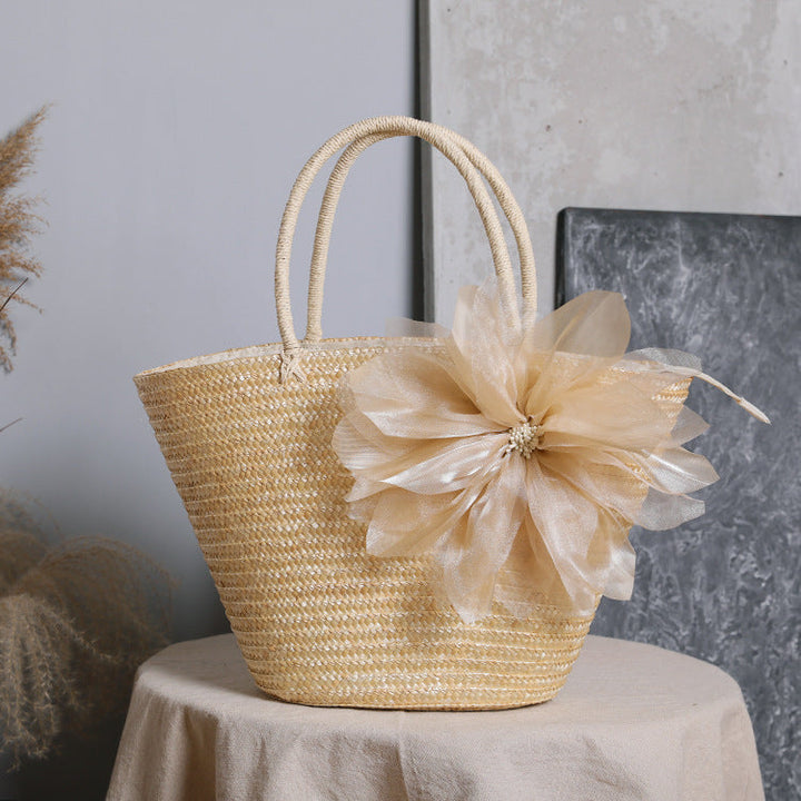 Stylish basket bag with eye-catching flower detail Kalsten