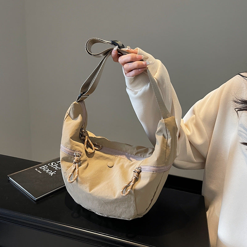 Practical shoulder bag with external zip pockets Kalsten