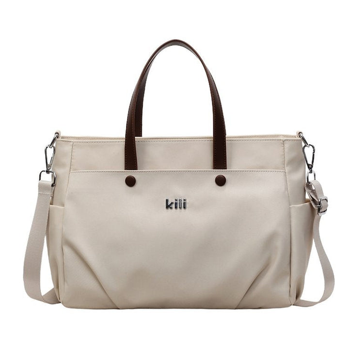 Shopping bag with comfortable carrying system and practical outer pockets Kalsten