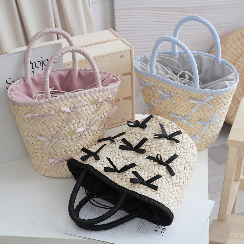 Basket bag with delicate bows and padded edge Kalsten