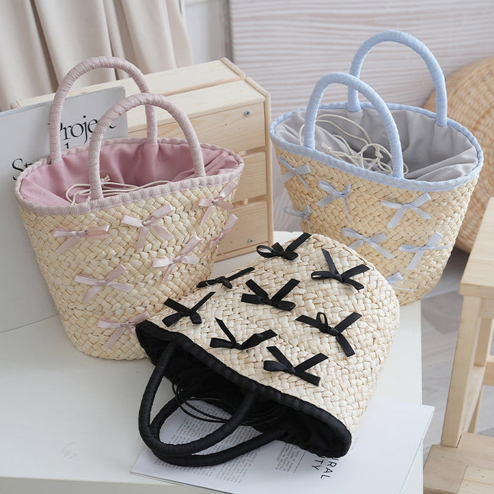 Basket bag with delicate bows and padded edge Kalsten