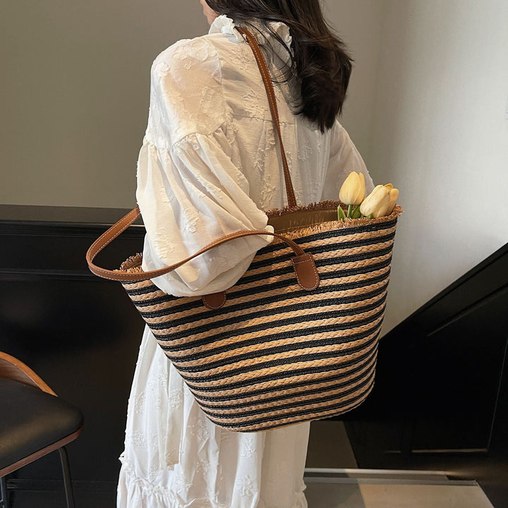 Generous beach bag with leather handles Kalsten