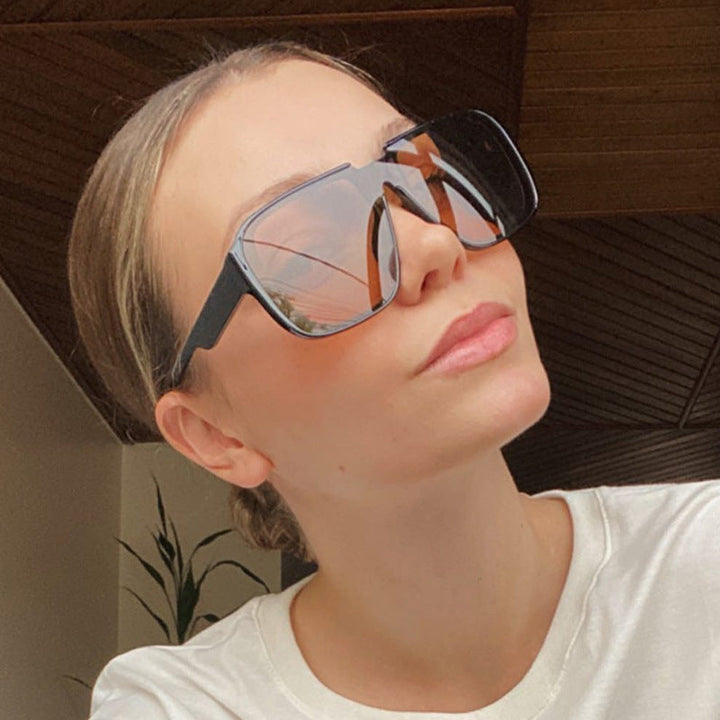 Ladies trendy square sunglasses with transparent green frame and protective UV filter Kalsten