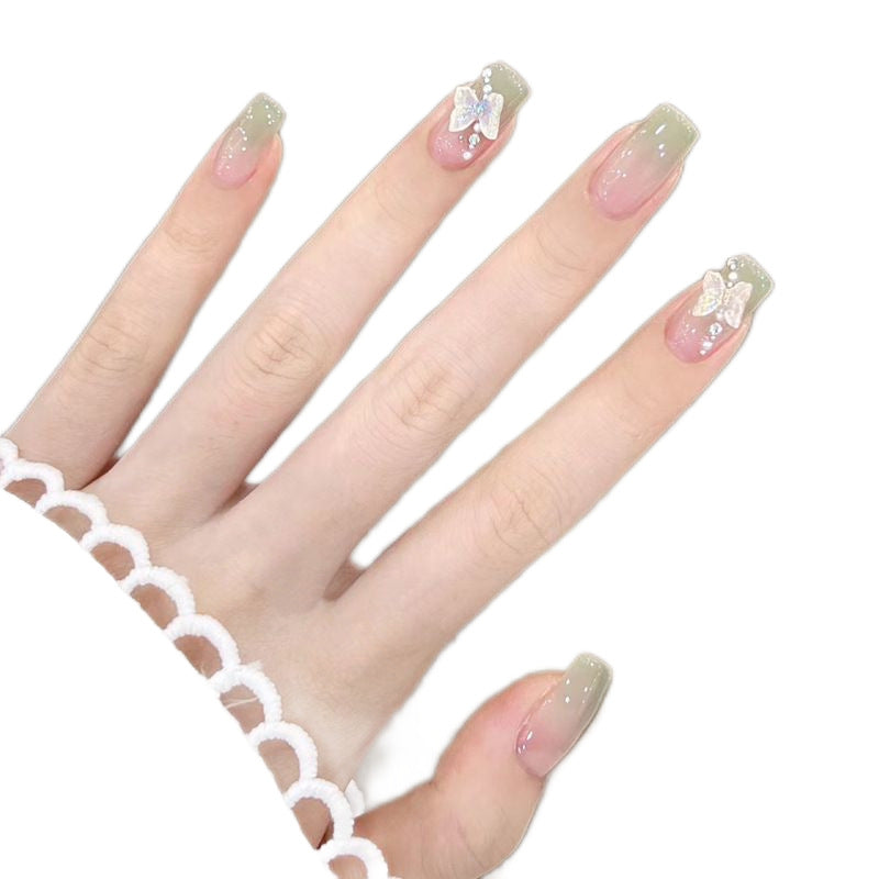 Artificial artificial nails with elegant ombre design and jewelry accents Kalsten