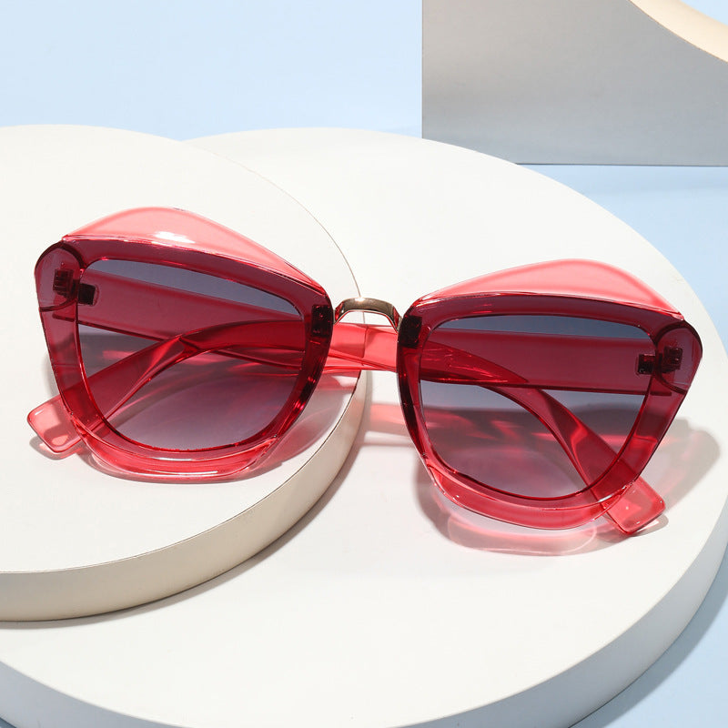 Women striking designer sunglasses with extravagant frame Kalsten