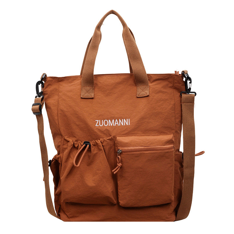Tote bag with multifunctional outer pockets and adjustable shoulder strap Kalsten