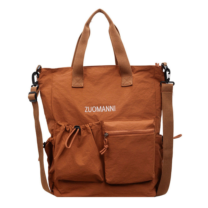 Tote bag with multifunctional outer pockets and adjustable shoulder strap Kalsten