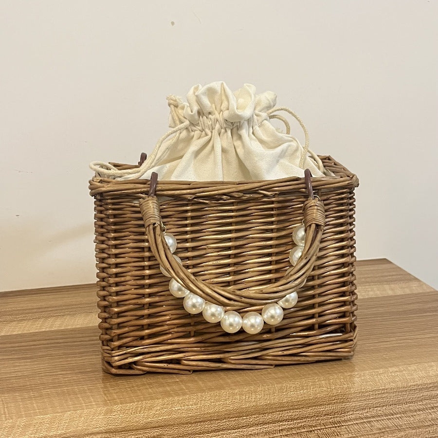 Ladies' basket bag with decorative pearl accents and bow decoration Kalsten