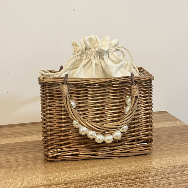 Ladies' basket bag with decorative pearl accents and bow decoration Kalsten