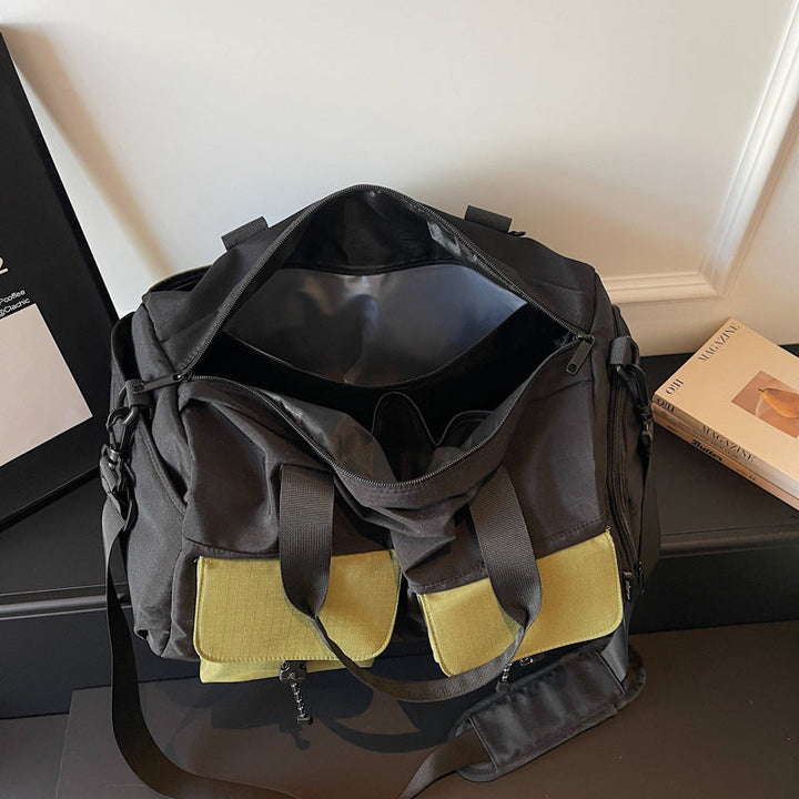 Multifunctional tote bag with comfortable shoulder padding and numerous outer pockets Kalsten