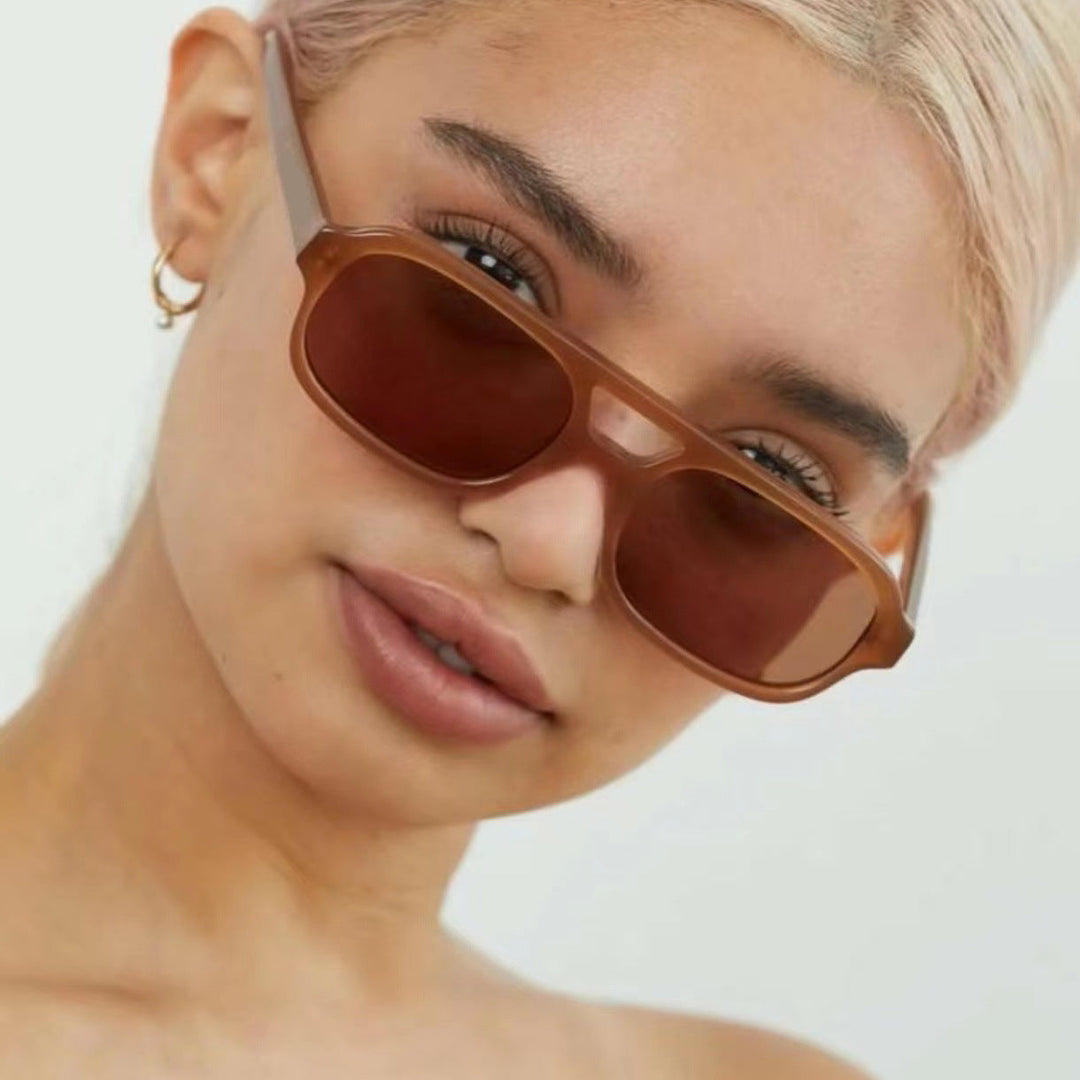 Women's fashionable square sunglasses made of transparent plastic Kalsten