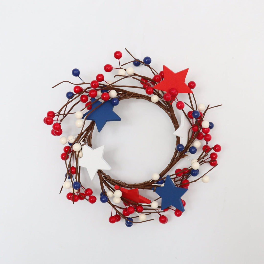 Unisex decorative door wreath with wooden stars and berry branches Kalsten