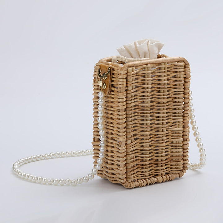 Women's handbag made of woven material with pearl accents Kalsten