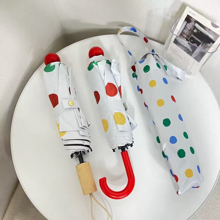 Ladies designer foldable umbrella with colorful polka dot pattern Kalsten