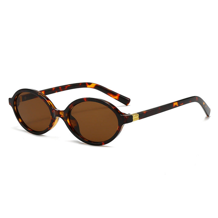 Women's fashionable oval glasses with golden accents Kalsten