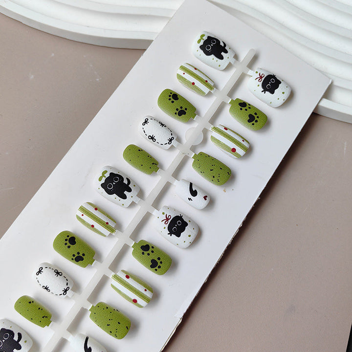 Creative art press-on nails with playful animal design Kalsten