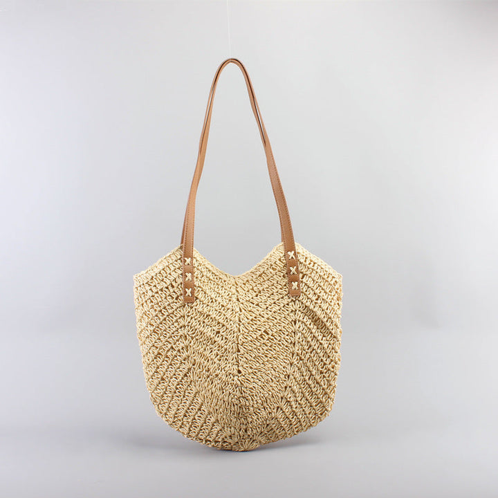 Casual bag made of handwoven straw with wide leather handles Kalsten