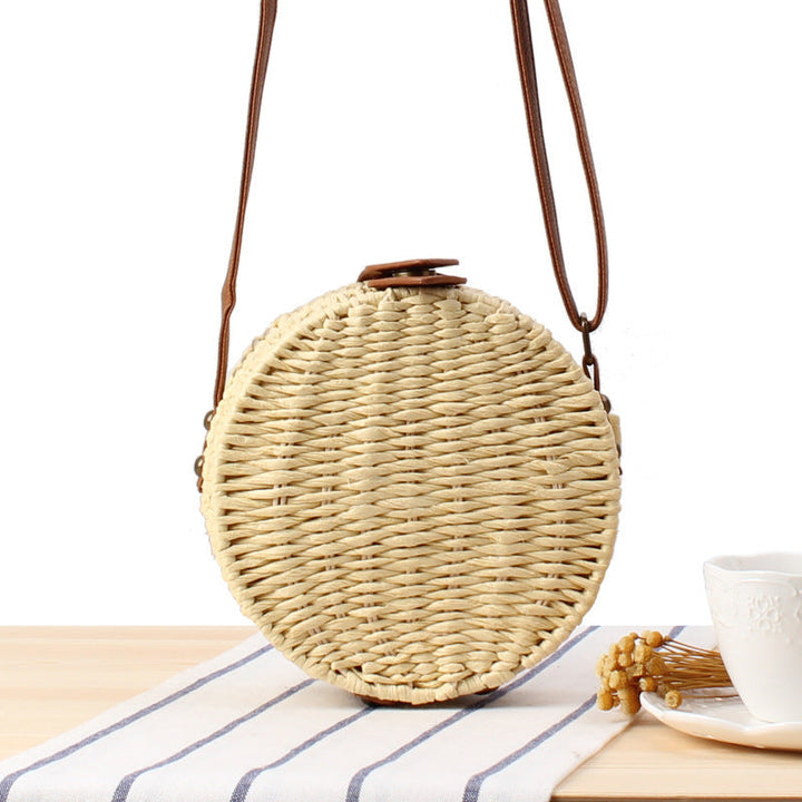 Round basket bag with leather accents Kalsten