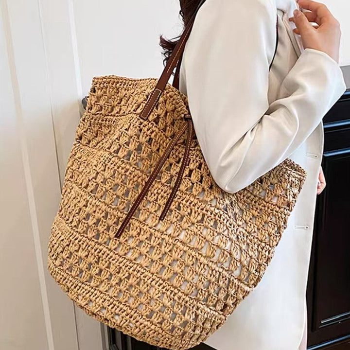 Woven natural material handbag with leather handles Kalsten