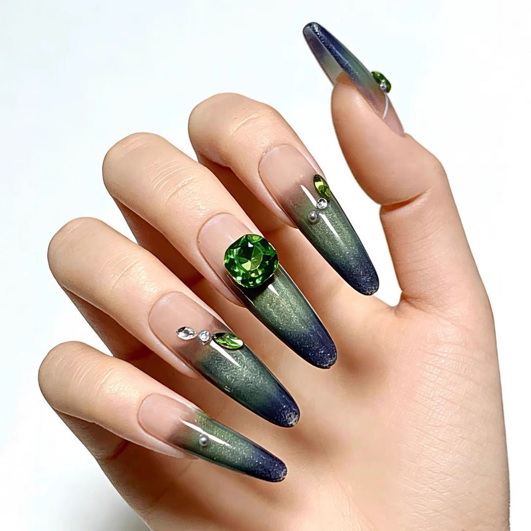 Artifical nails with elegant ombre design and sparkling accents Kalsten