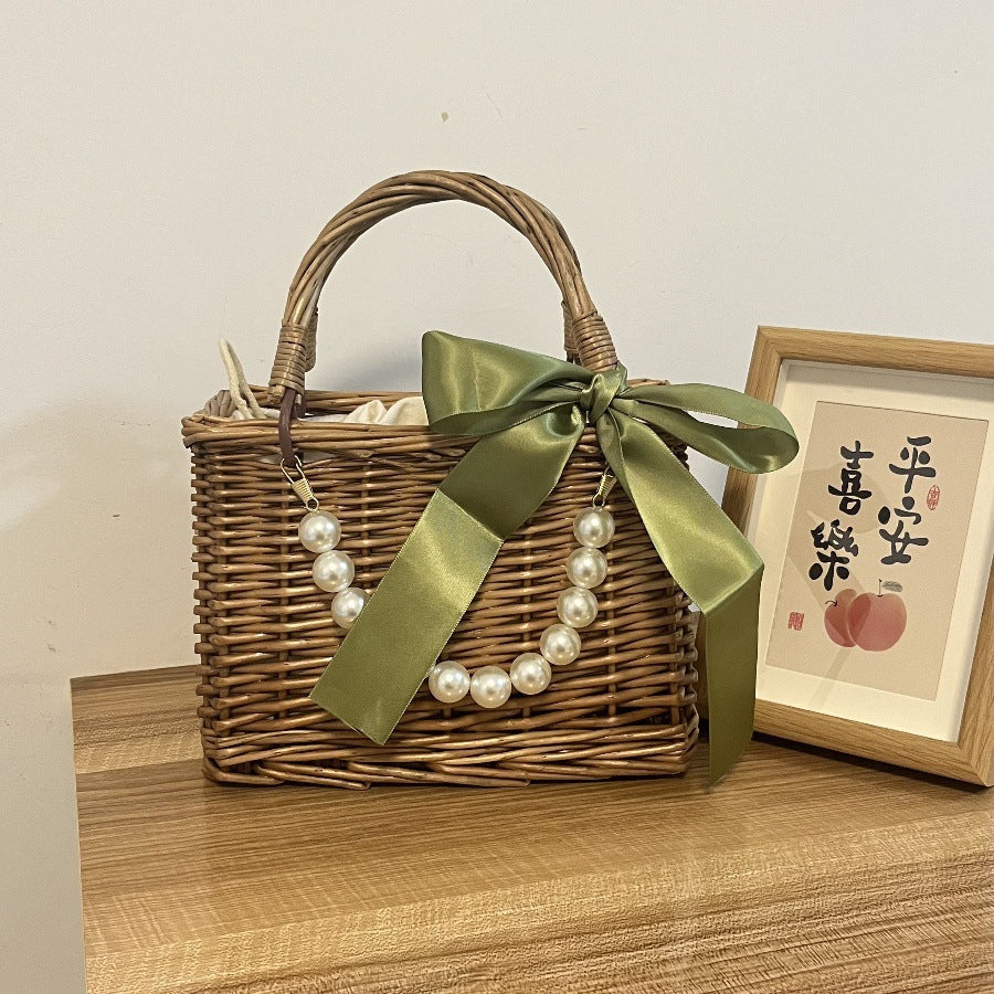Ladies' basket bag with decorative pearl accents and bow decoration Kalsten