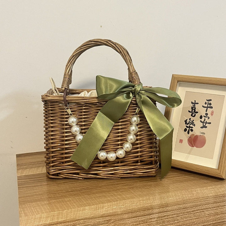 Ladies' basket bag with decorative pearl accents and bow decoration Kalsten