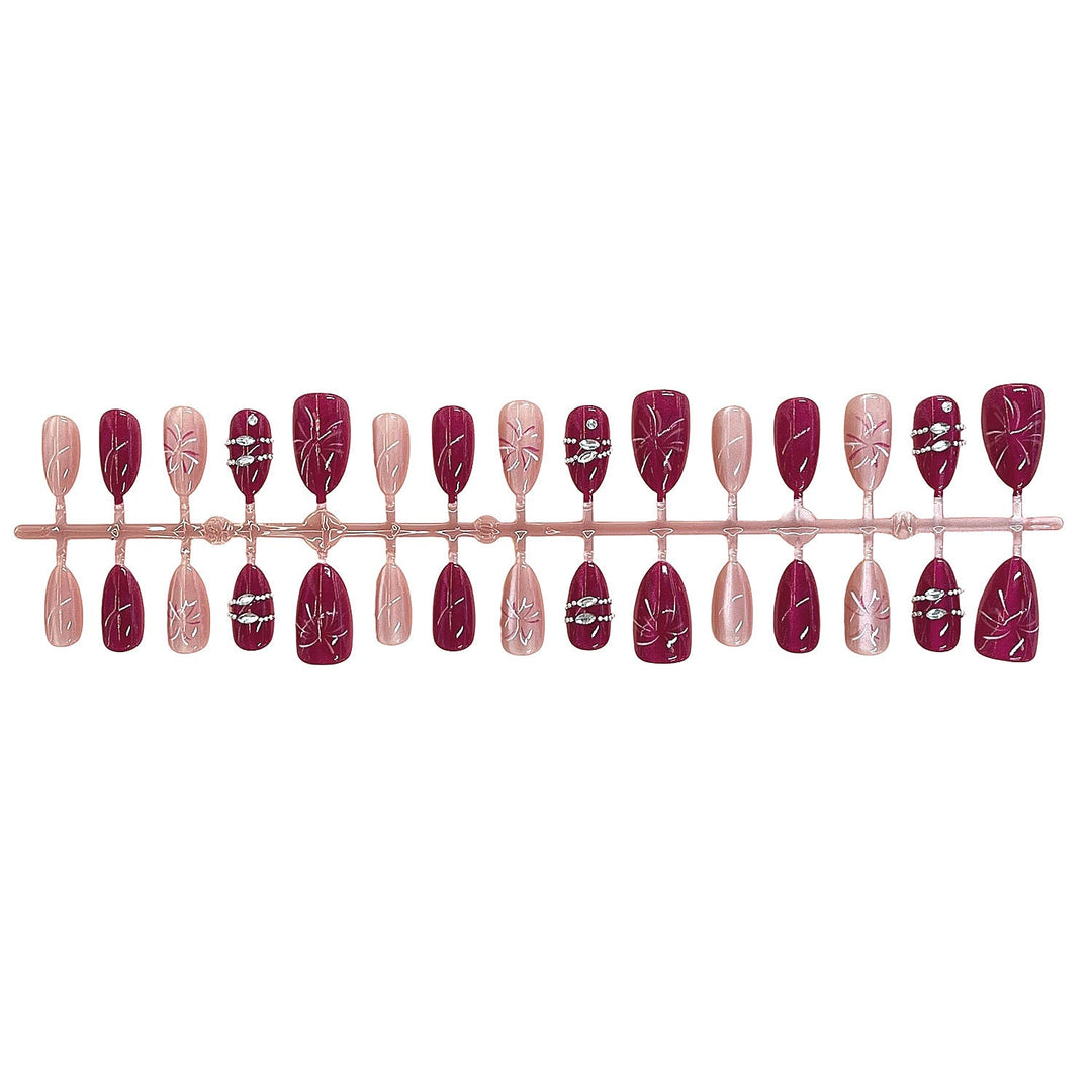 Artistic Press-On Nail Set with Floral Patterns and Gem Accents Kalsten