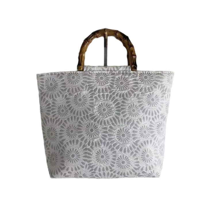 Exclusive and handcrafted beach bag with bamboo handles Kalsten
