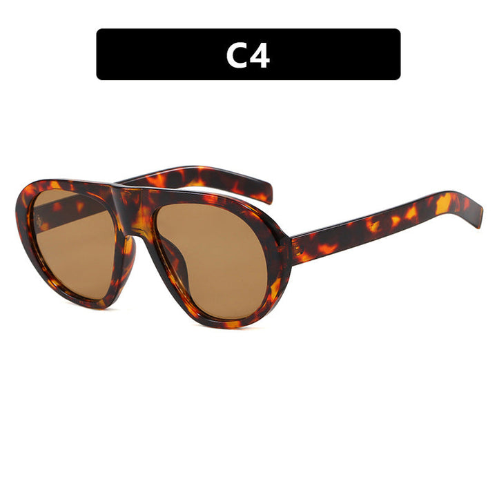 Women striking sunglasses with futuristic frame and sturdy design Kalsten