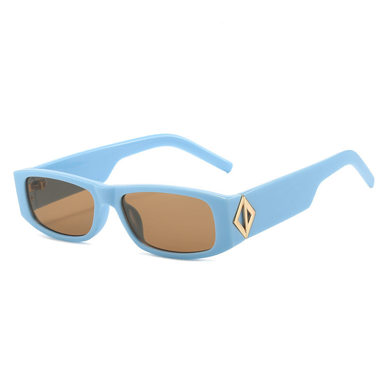 Ladies fashionable sunglasses with asymmetrical frame and gold-colored details Kalsten
