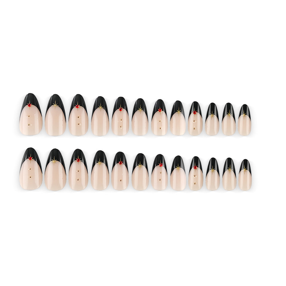 Glamorous artificial nails in stylish stiletto design with golden accents Kalsten