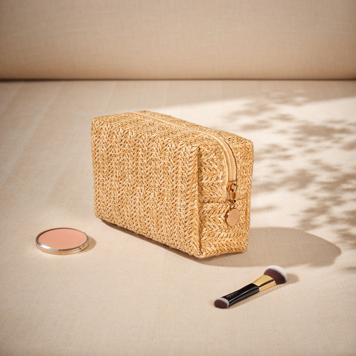 Cosmetic bag made of natural rafia material with elegant design Kalsten
