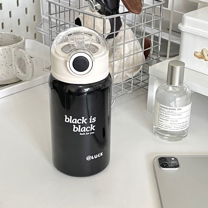 Women's insulated drinking bottle with innovative flip lid and practical handle Kalsten