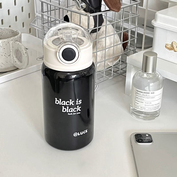 Women's insulated drinking bottle with innovative flip lid and practical handle Kalsten