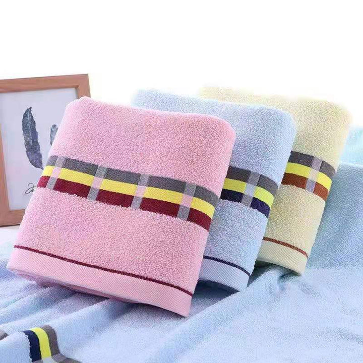 Women’s terry bath towel with elegant striped border Kalsten
