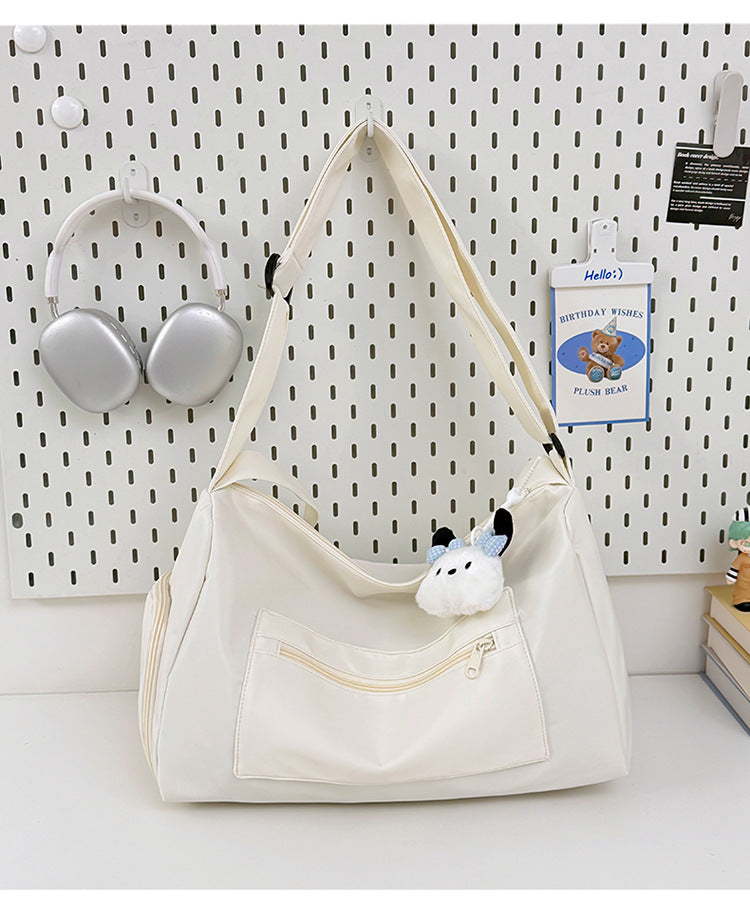 Sporty shoulder bag with spacious interior and sturdy carrying strap Kalsten